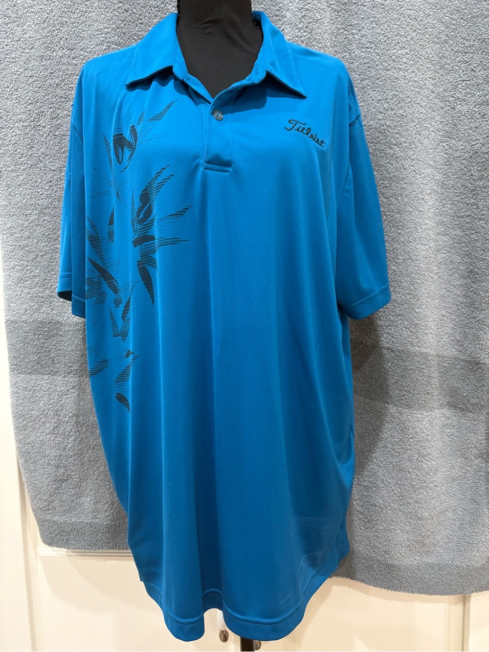 Izod Men’s Bright Blue Polo with Subtle Graphic